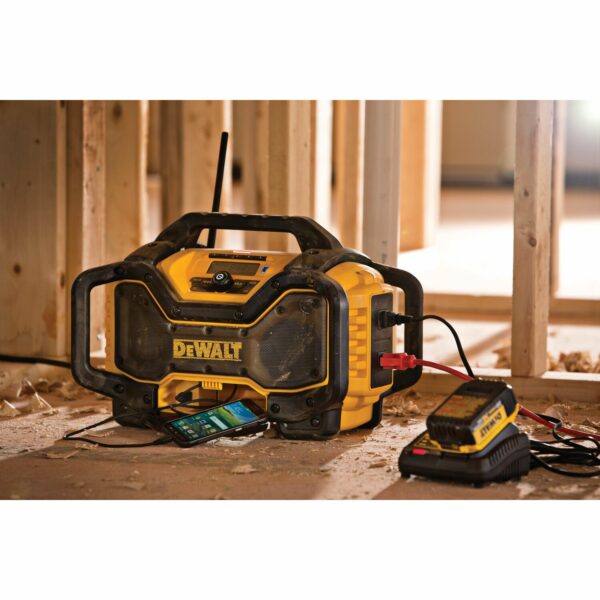 DEWALT DCR025 Portable Radio & Battery Charger on jobsite connected to 20v Max Battery